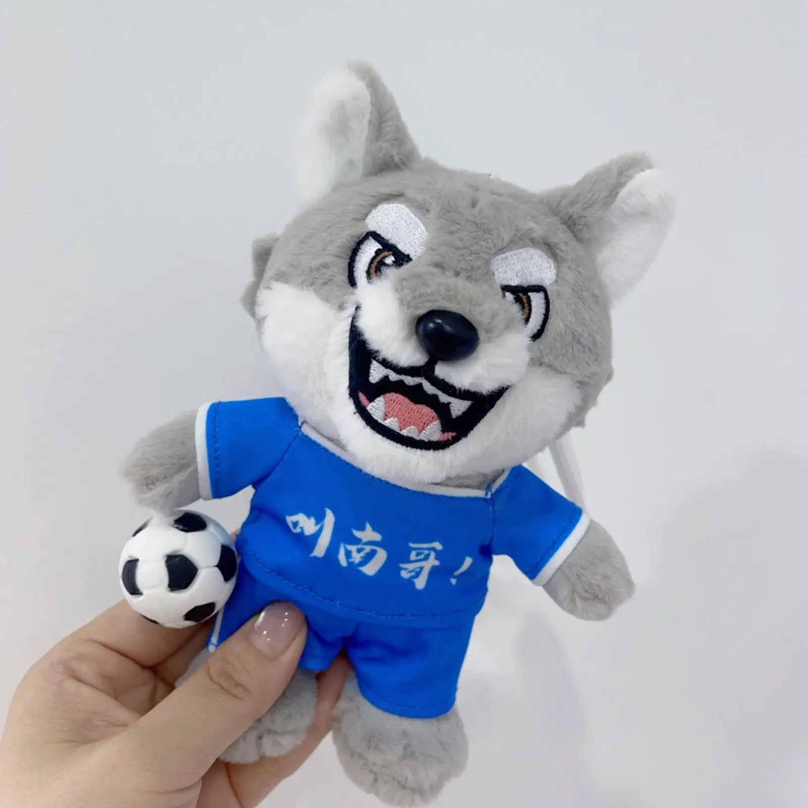 Lupo Peluche Lupo Peluche Cartone animato Ciondolo che suona Decorazione della casa per adulti Bambini Letto per dormire Passeggini da viaggio Zaini Vacanze