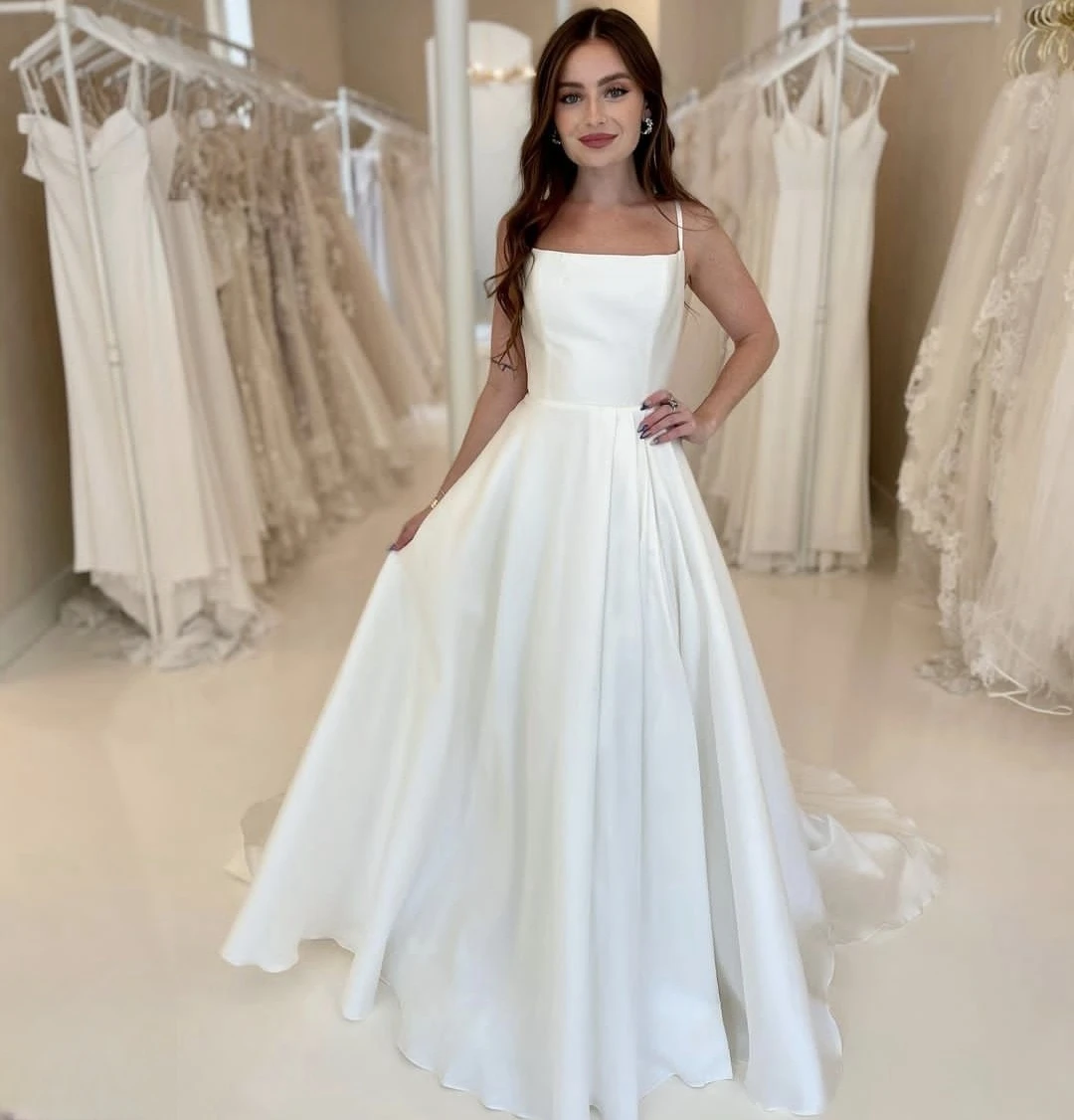 Vestidos de novia ชุดสายเดี่ยวแต่งงาน A-Line ความยาวของพื้นปรับแต่งเพื่อวัดความยาวของชุดเจ้าสาวเสื้อคลุม Charming