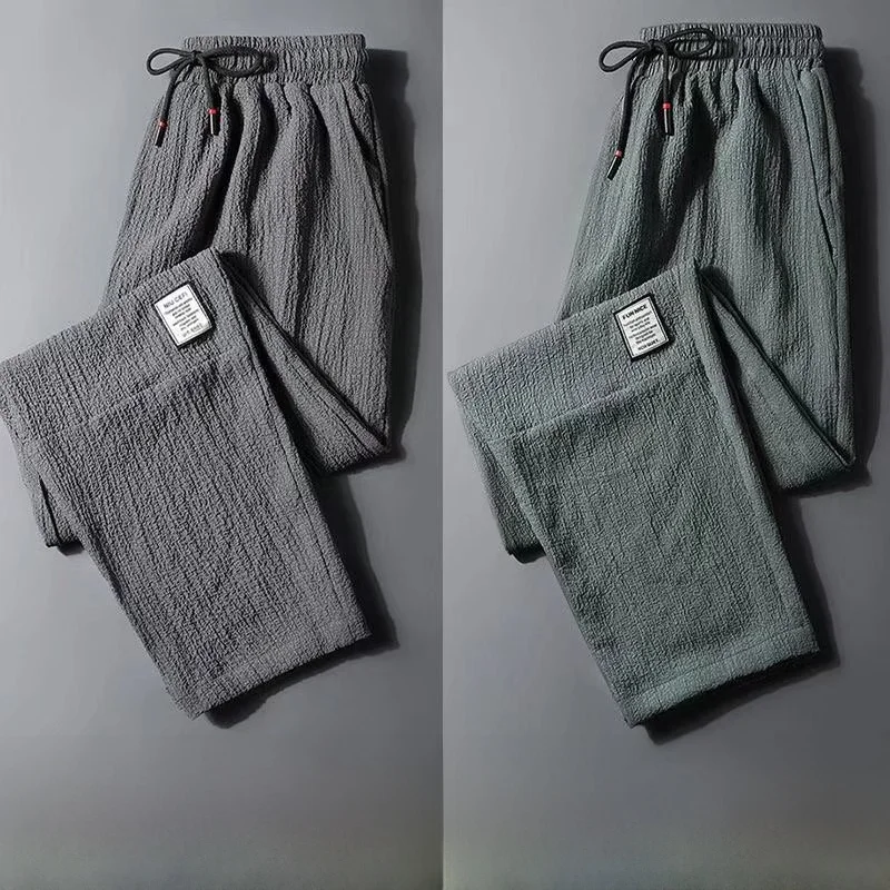 

Мужские летние ультратонкие свободные льняные брюки из ледяного шелка больших размеров, повседневные спортивные брюки, модные молодежные брюки, удобная посадка