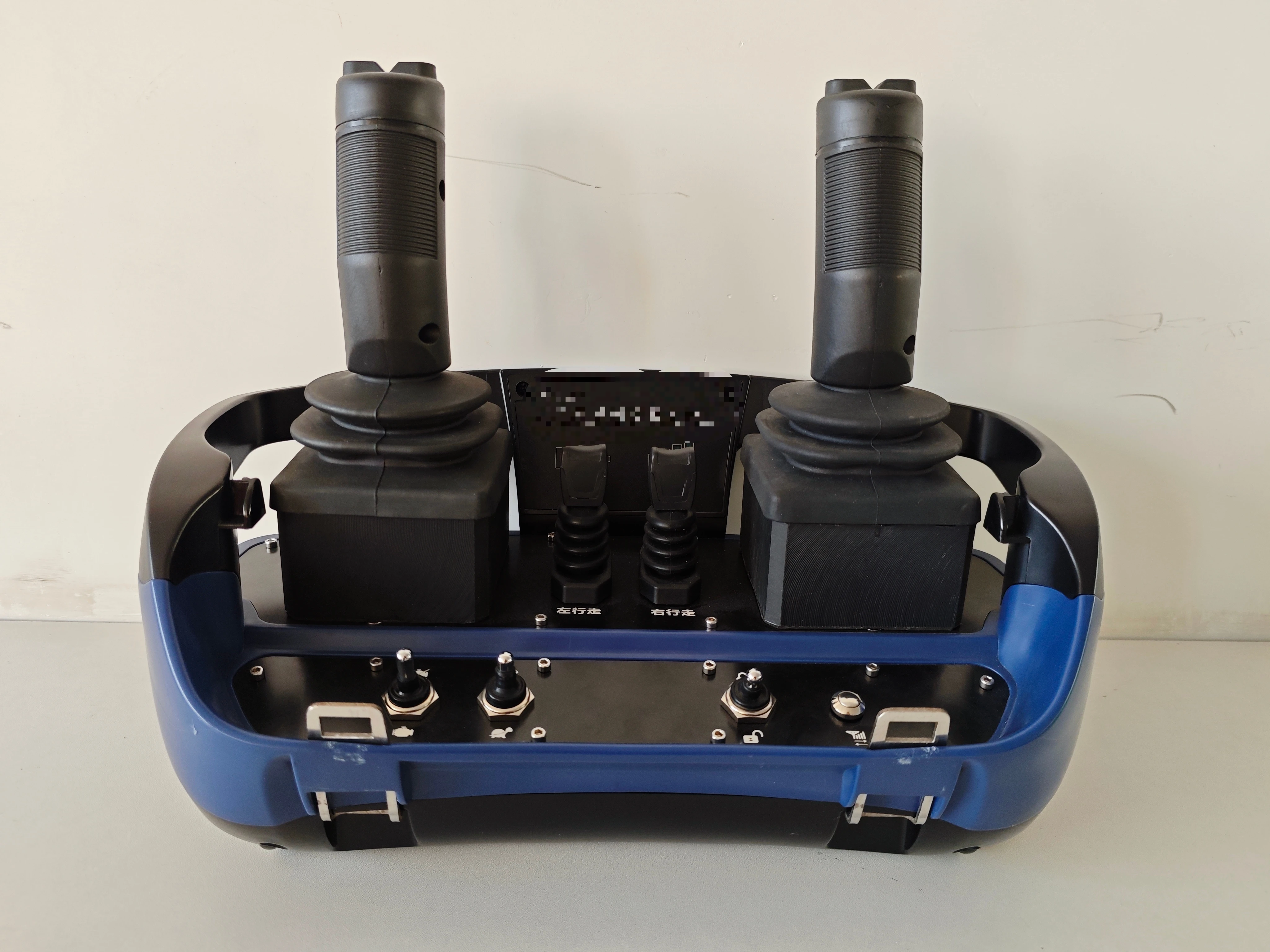 Solid and Highly Flexible Radio Remote Control for Proportionally Controlled Hydraulic Equipment Nearly Hydraulic Control System