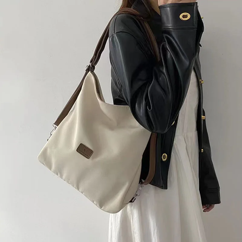 Płócienna Tote torba damska nowa wysoka pojemność i minimalistyczna plecak szkolny moda wszechstronna na co dzień jeden Crossbody na ramię
