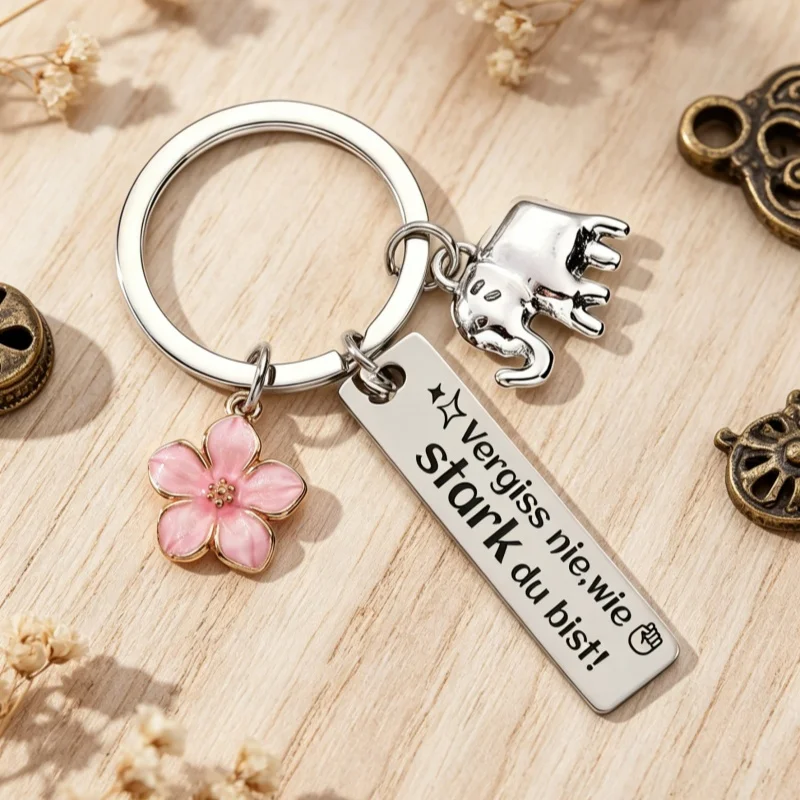 1 Stück Süßer Elefanten-Blumen-Schlüsselanhänger aus Edelstahl mit Deutscher Gravur, Taschenanhänger, Schlüsselring als Ermutigungsgeschenk