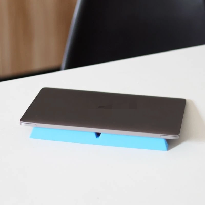 Portable office laptop radiator bracket, elevated base, computer desktop tablet, environmentally friendly silicone material