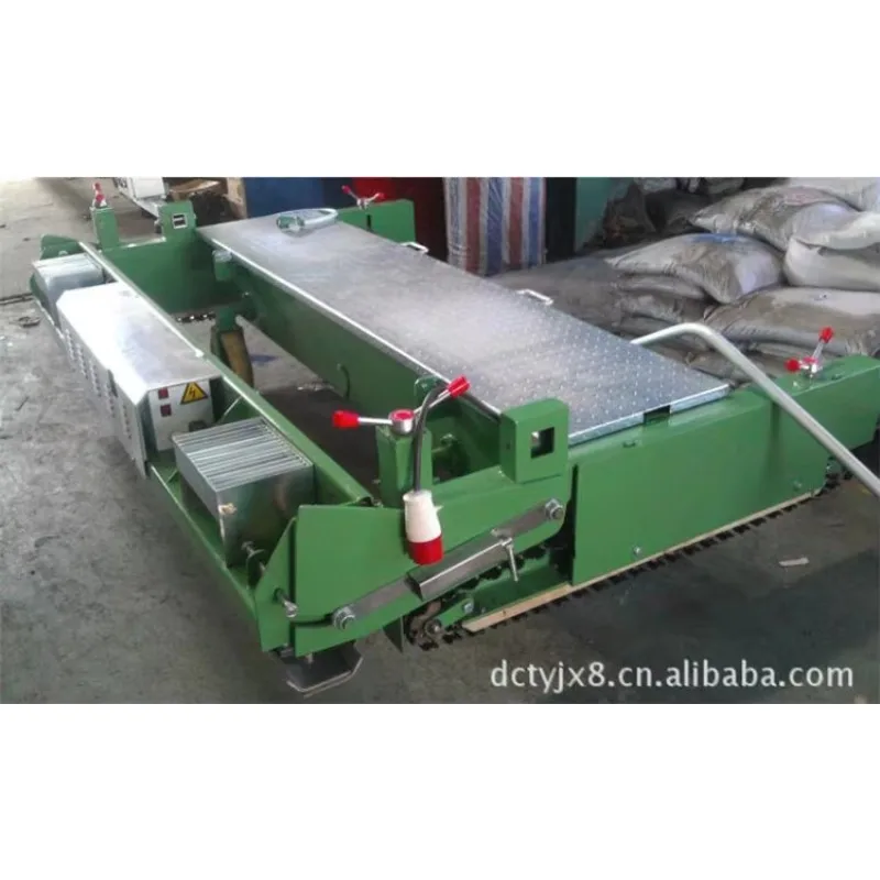 Rubber paver A track paver used for laying plastic runways