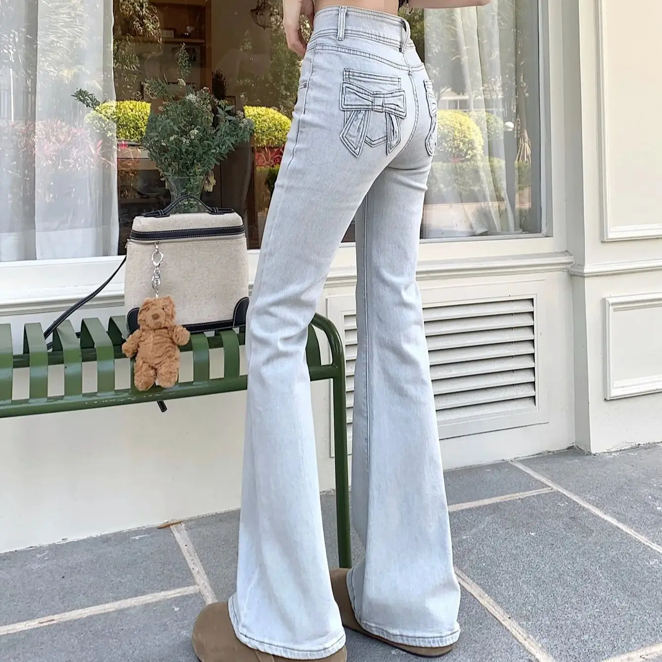 

2025 high waist micro-flare elastic denim trousers for women retro wash back bag bow mopping pants