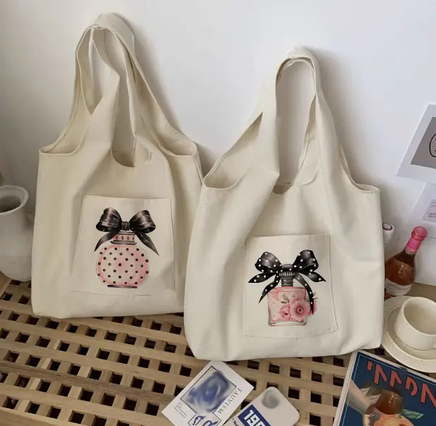 

Large capacity handbag with perfume pattern, casual portable shoulder bag, portable shopping bag, large reusable background bag