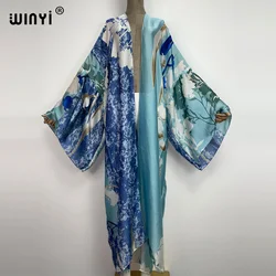 WINYI 2022 lato kobiety modny nadruk z długim rękawem sweter luźna bluzka na co dzień okrycie plażowe Up koszule Kimono Blusas Robe Sexy