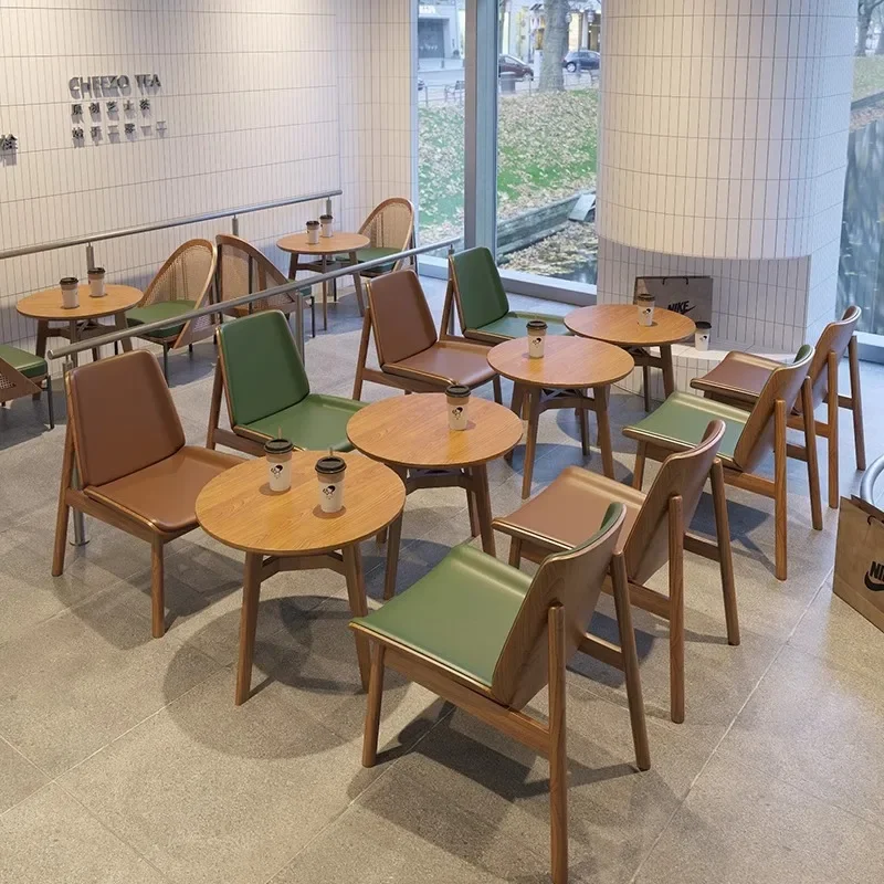 Cafe sofa rattan single sofa chair solid wood designer wabi sandy wind medieval chair catering milk tea shop table and chair