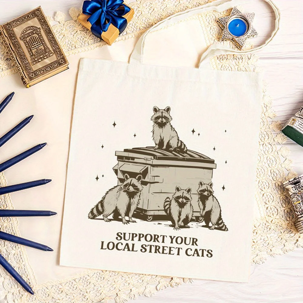 A Interesting raccoon Pattern printed canvas tote bag, suitable for daily use, shopping, school, and travel