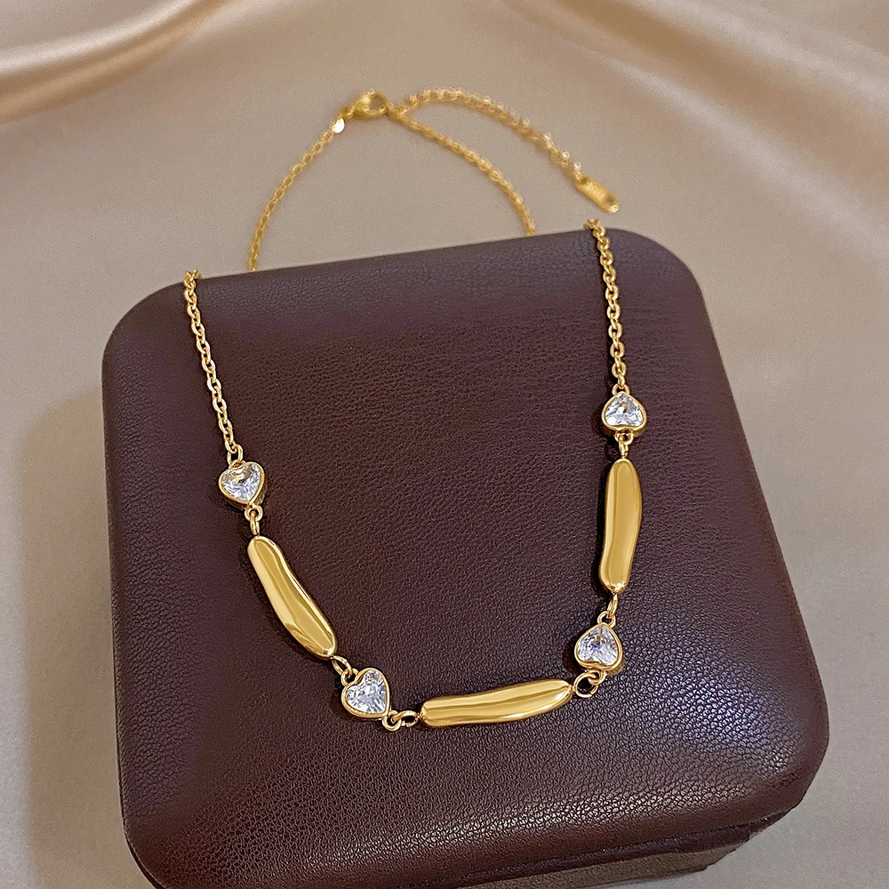 AENSOA Damen Halskette aus Edelstahl in Goldfarbe, lange, zierliche Halskette mit Herz-Zirkon-Verzierung, klassisches Schmuckstück für Partys, Geschenk. – Detail 4