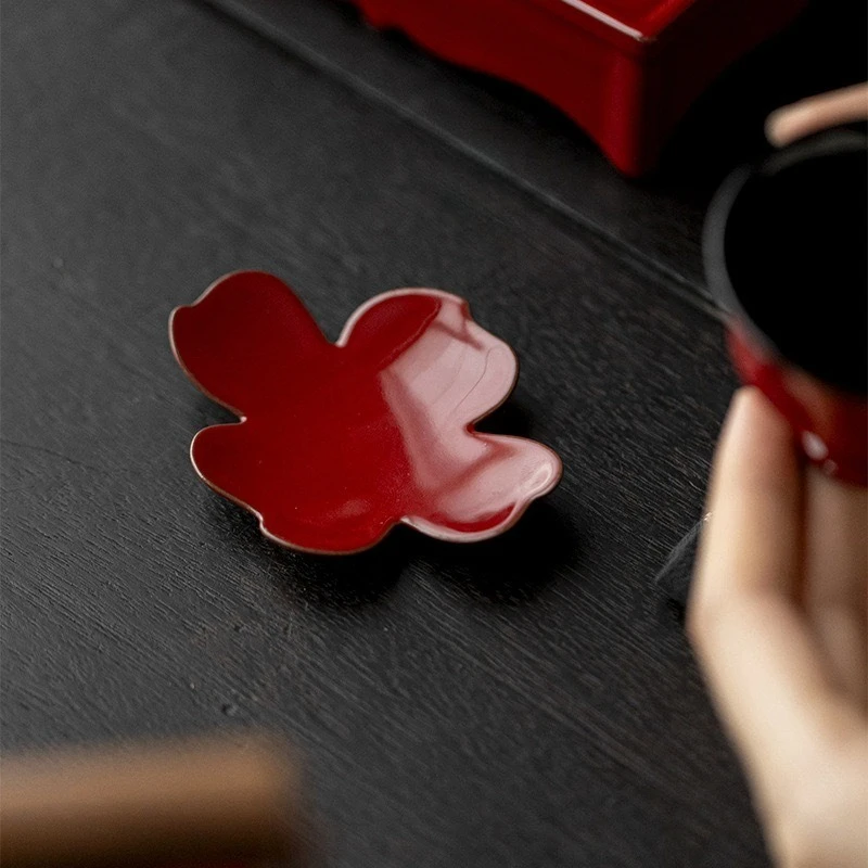 Retro Keramik Teetasse Pad Licht Luxus chinesische Teetablett Wärmedämmung Pad handgemachte vierblättrige Kerze unten Sockel