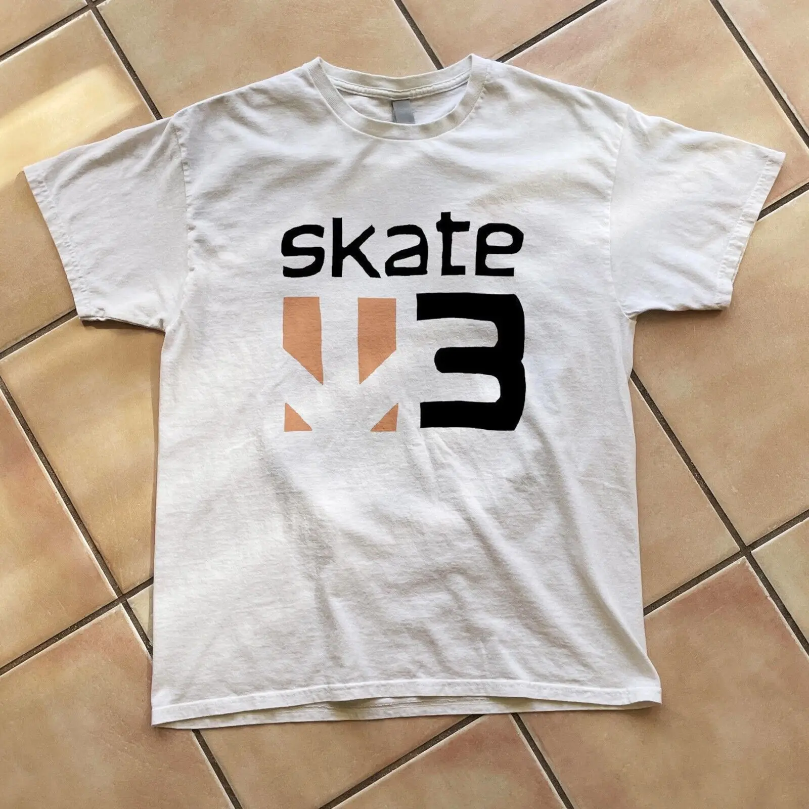 

Skate 3 logo, nostalgia tee, Vintage gaming T-Shirt, 2000s aesthetic Retro promo