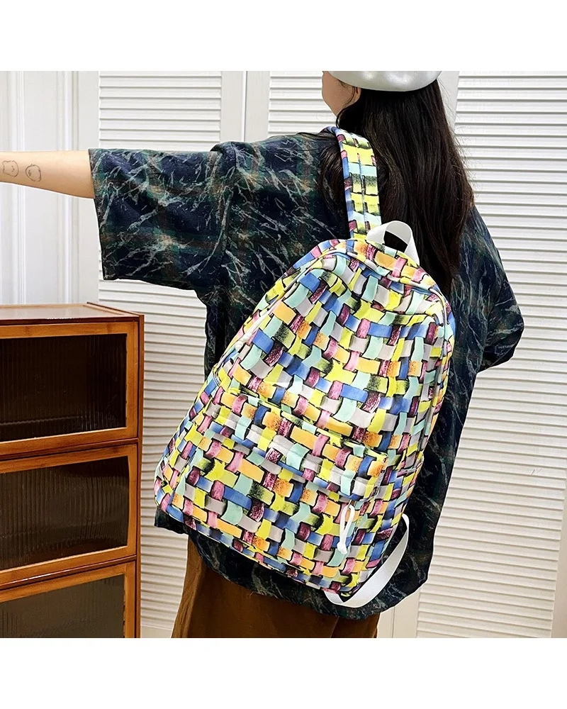

Niche woven pattern outing backpack women's Korean version of leisure travel backpack new simple daily commuter backpack