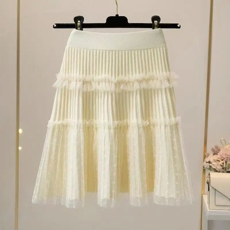 Nuevo 2026 Mini falda de malla de moda Falda corta de punto empalmado para mujer primavera otoño media longitud faldas con volantes de gama alta para mujer