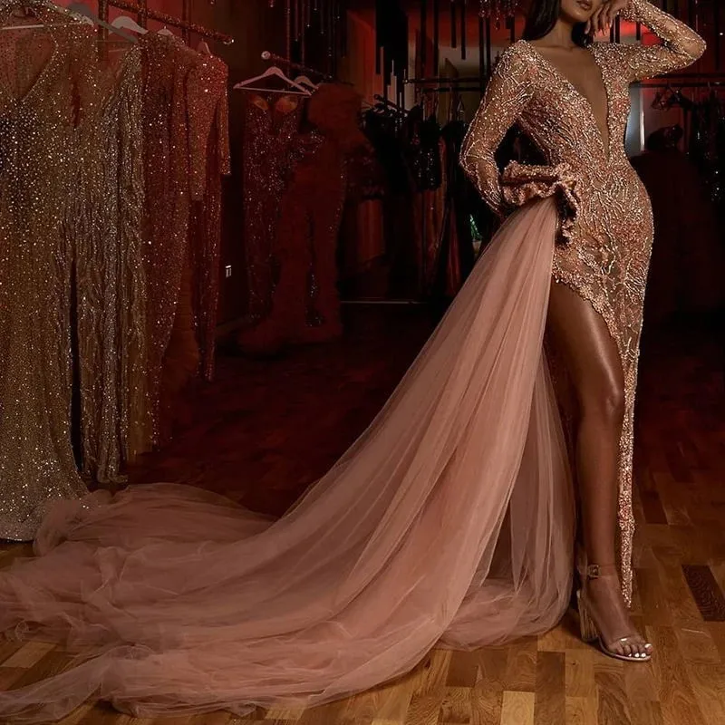 

A new fashionable dress with golden tassels and fit