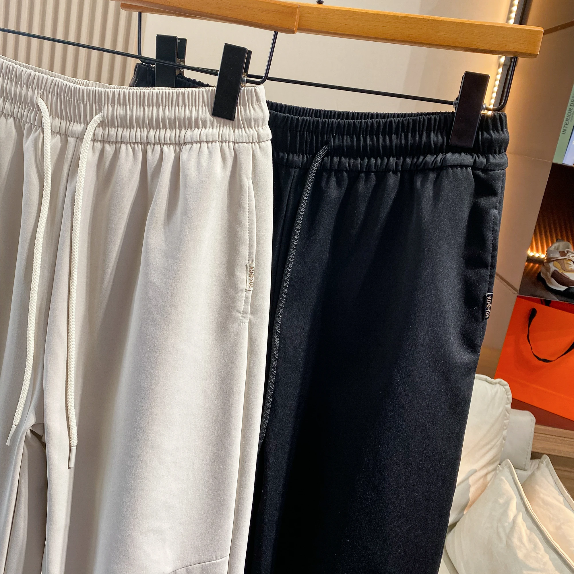 Thened down الشتاء السراويل الدافئة زوجين Sle يندبروف مقاومة للماء أوزة أسفل السراويل عارضة للرجال والنساء