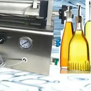 Máquina de llenado de líquidos con pistón neumático de doble boquilla para vino, leche, vinagre, aceite, desinfectante de manos, máquina de llenado cuantitativo