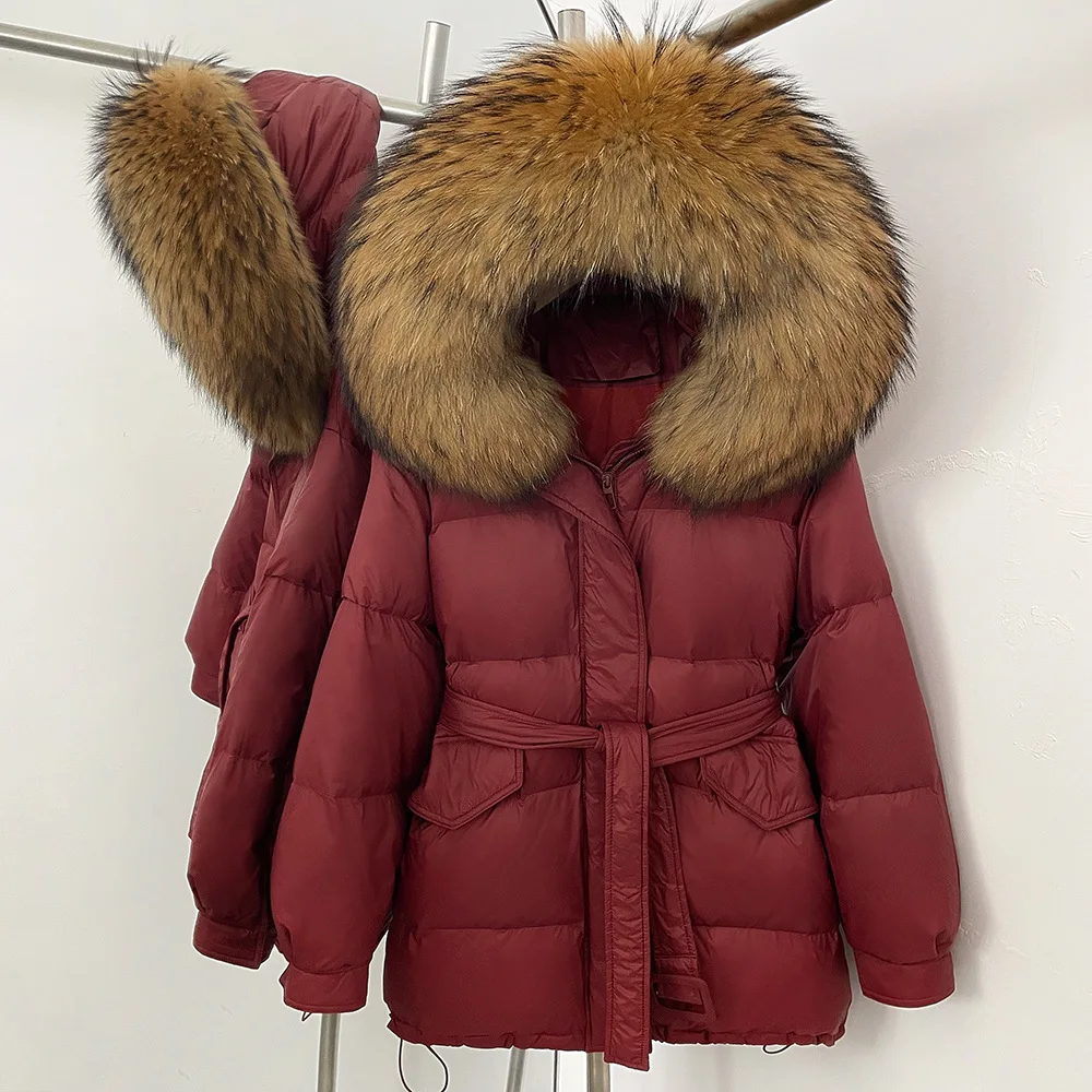 Stile coreano elegante collo di pelliccia di volpe di fascia alta con cappuccio giacche longuette inverno casual allentato spesso caldo cintura sottile piumini da donna