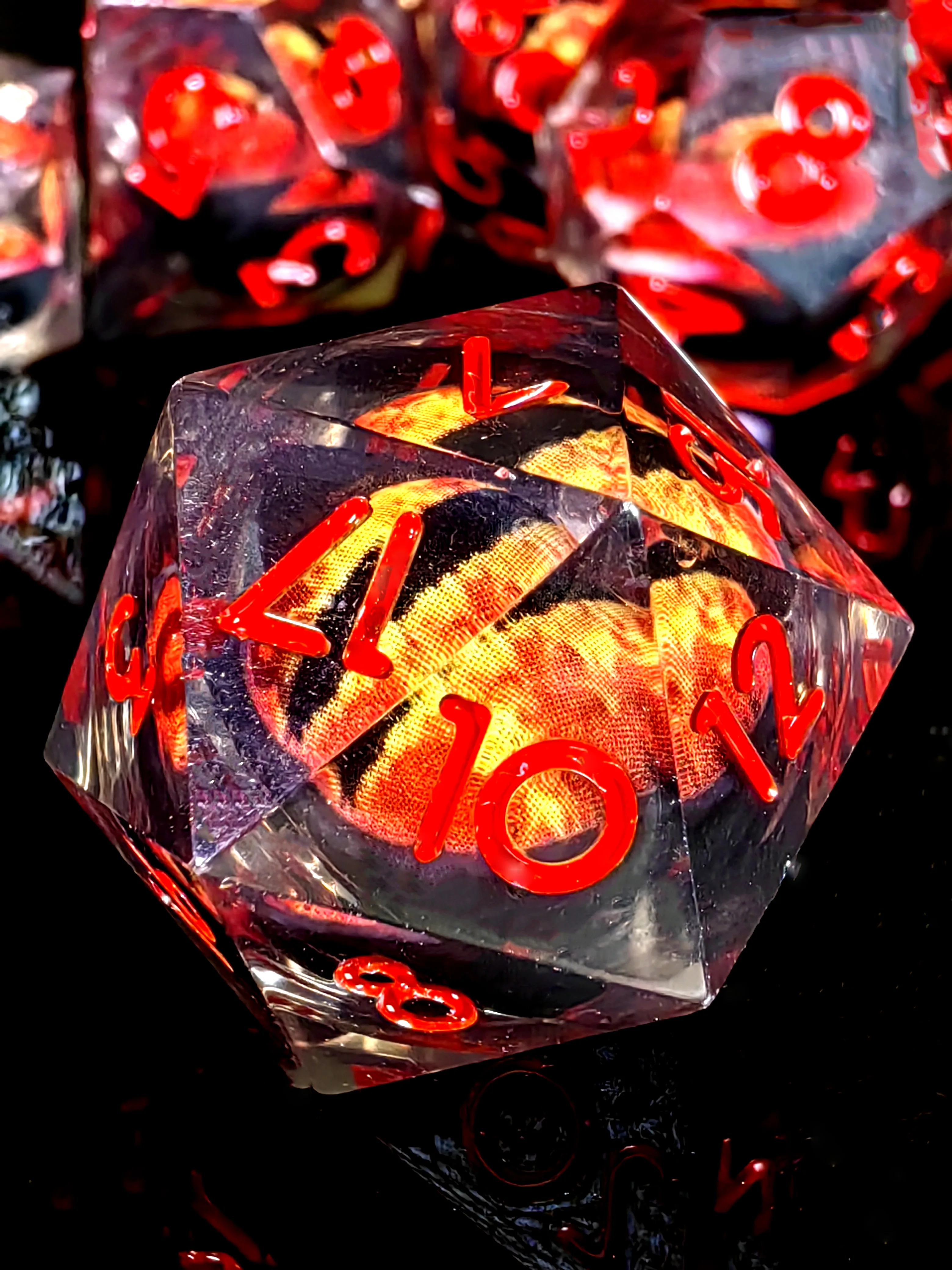 DnD Dice Set - 7-Piece Resin Dice with Spinning Dragon Eye Core, Transparent Base Red Lettering for Tabletop RPG and Board Games