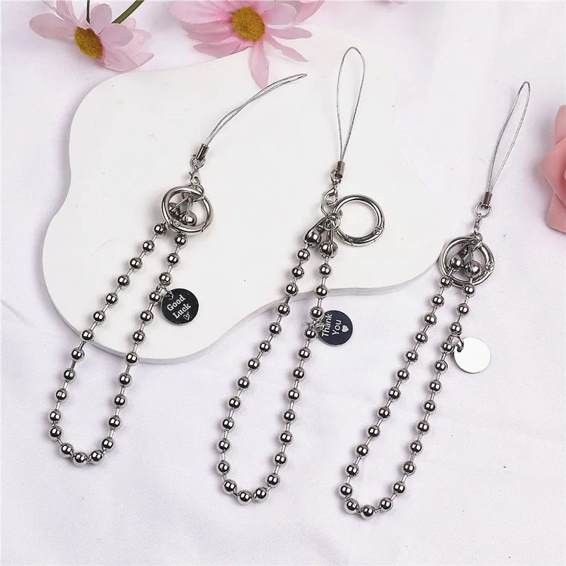 

Чехол для мобильного телефона с цепочкой из бусин, подвеской из нержавеющей стали, ремешком-шнурком для защиты от падения, аксессуар для студенческой сумки.