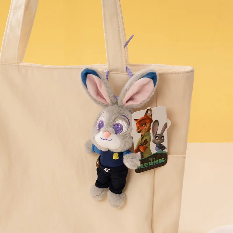 Porte-clés en peluche véritable Zootopia périphérie sac à dos décoration pendentif voiture porte-clés amoureux Bestie cadeau
