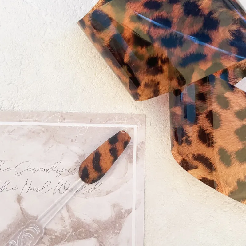 Carta di trasferimento della stagnola del chiodo della stampa del leopardo fogli di arte del chiodo ambra fiamma animale per le decorazioni di arte delle unghie del fuoco decalcomanie di Sanke