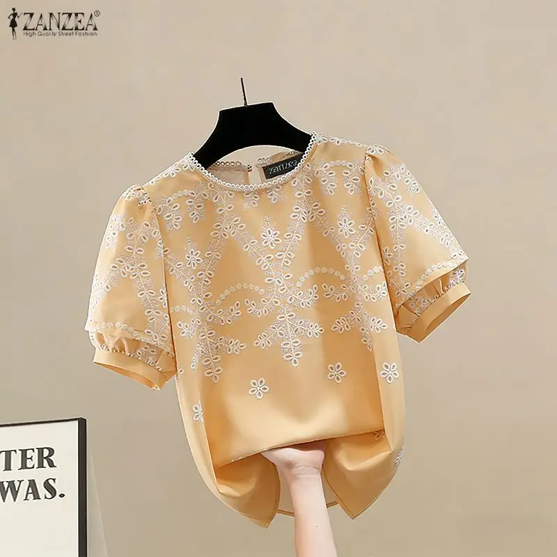 

ZANZEA винтажные женские топы, блузка с коротким рукавом, летние кружевные лоскутные рубашки с круглым вырезом и цветочным принтом, 2026, модные повседневные свободные блузки