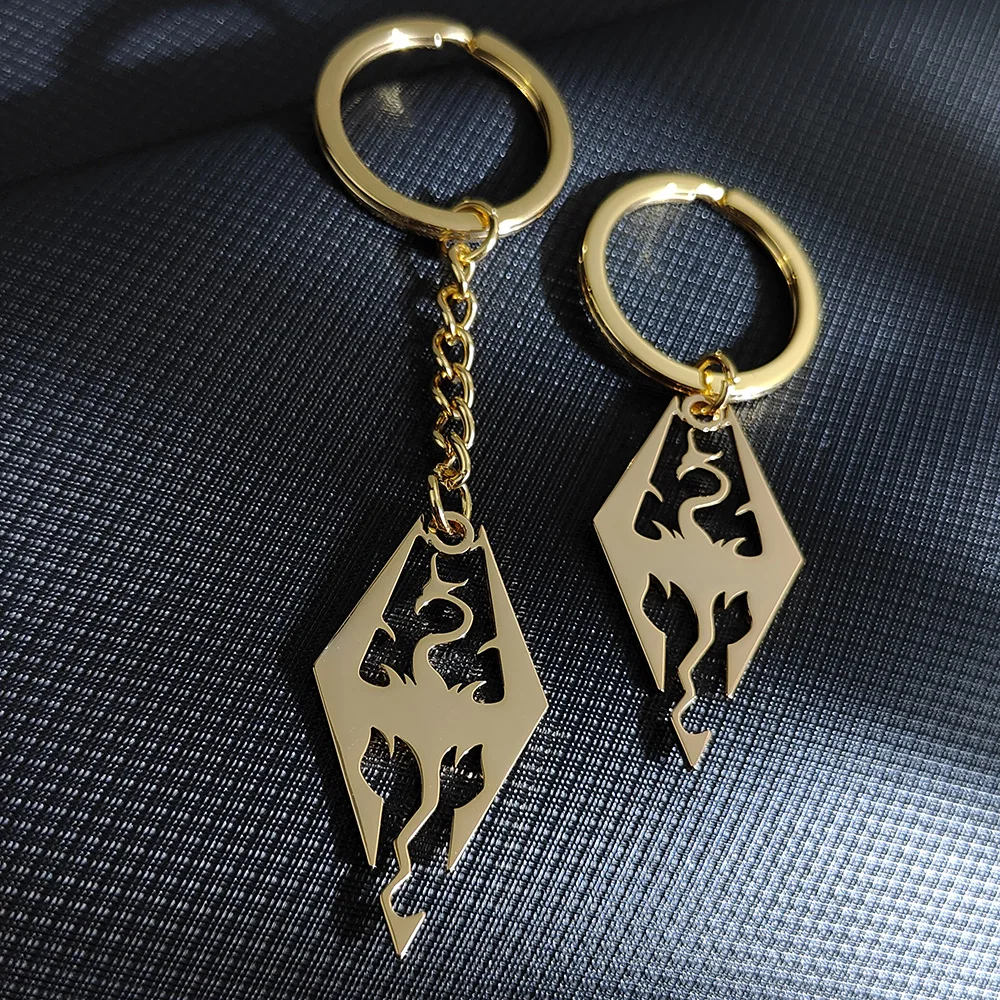 Llavero anticorrosión chapado en oro con colgante de acero inoxidable The Elder Scrolls Dragon, universal para hombres y mujeres, lujo ligero