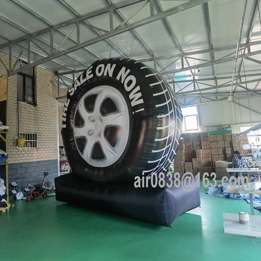 Globo inflable gigante personalizado del neumático con el modelo al aire libre inflable del neumático del coche del ventilador para la publicidad