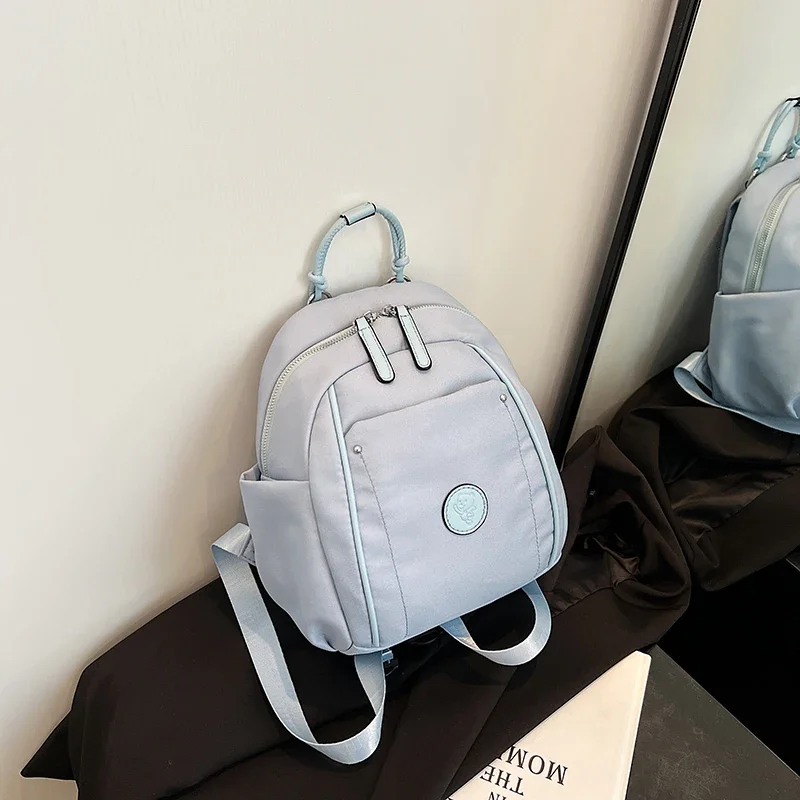 Mochila informal De nailon con cremallera para Mujer, Bolso De gran capacidad, versátil y sencillo, portátil, 2024