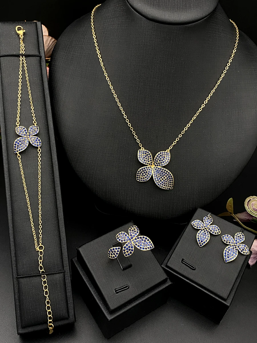 

Комплект украшений из 4-листного клевера с медным покрытием Flora и гальваническим покрытием из кубического циркония, женская повседневная одежда