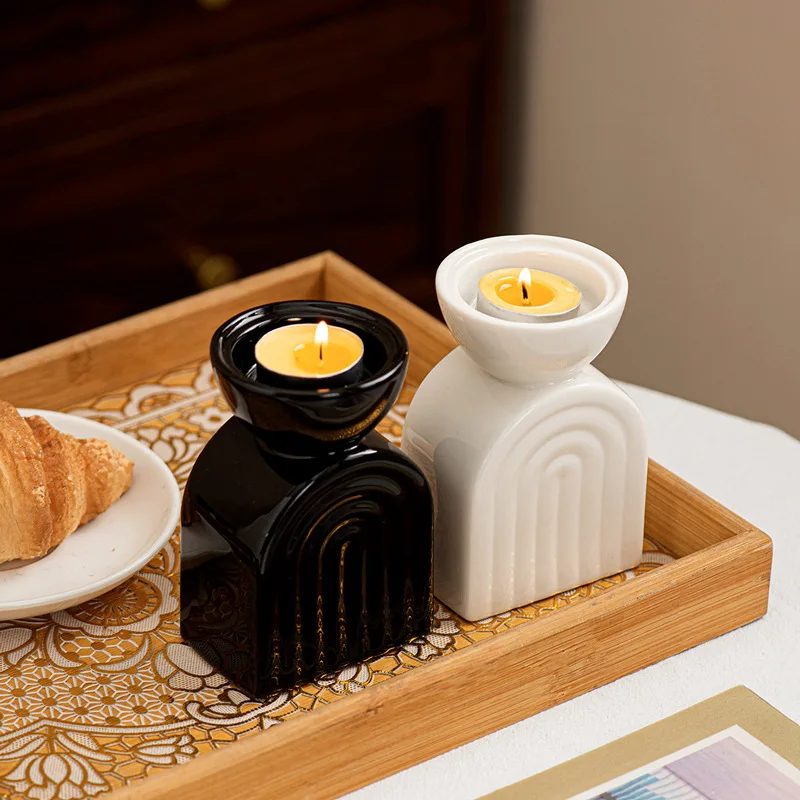 

Modern minimalist black and white ceramic arch shaped base candle holder home dining table wedding decoration candle holder