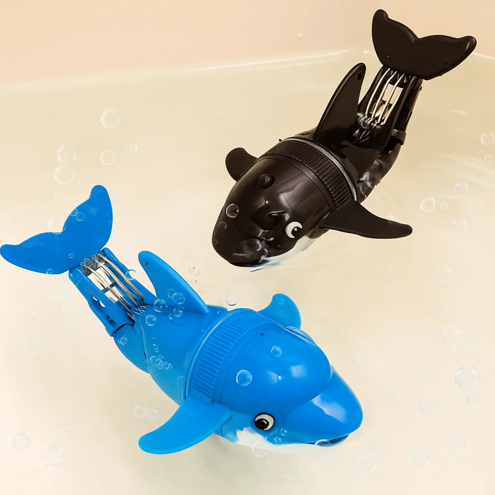 漫画デザインの電動イルカ、電動スイングアクション、電動魚の回転運動、水で動く、水遊び