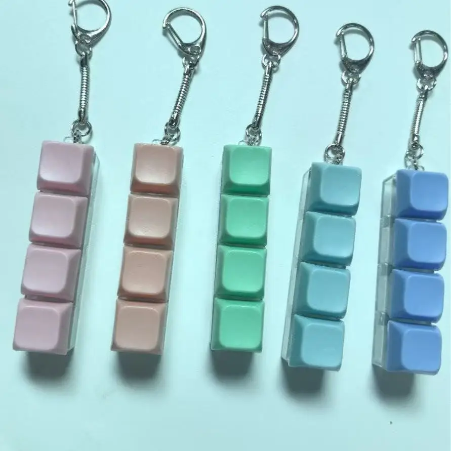 jouet-anti-stress-rectangulaire-a-4-boutons-couleur-macaron-testeur-d'axe-de-cle-jouet-de-doigt-tendance-pour-soulager-l'anxiete