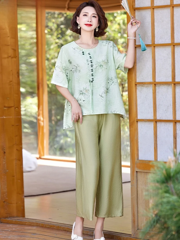 

Свободный комплект из хлопка и льна для женщин среднего возраста: летний новый топ с коротким рукавом и брюки, модная одежда больших размеров для женщин.