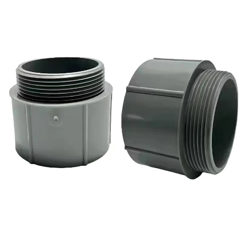 Injection Moulding Plastic Service Gray plastic pipe fittings and joints made of PVC, HDPE, and ABS materials.