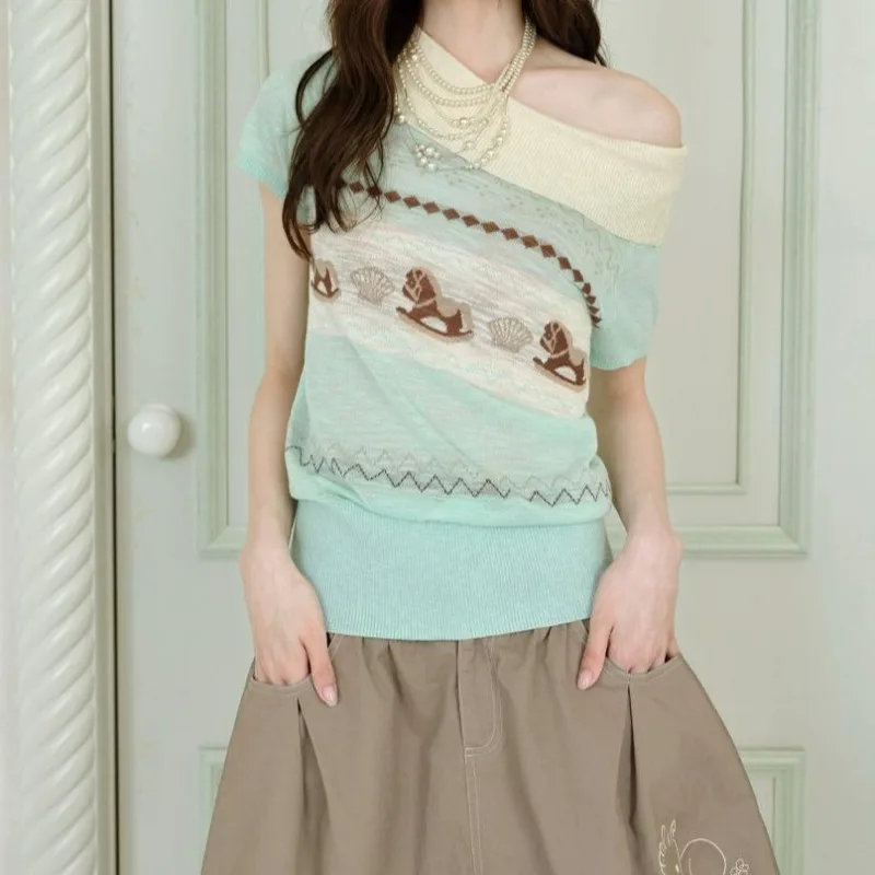 The New Autumn Fashion Green Grass Brown Little Marcel Tencel Sweater for Women Is Fresh Bright. The T-shirt Is Elegant Stylish.