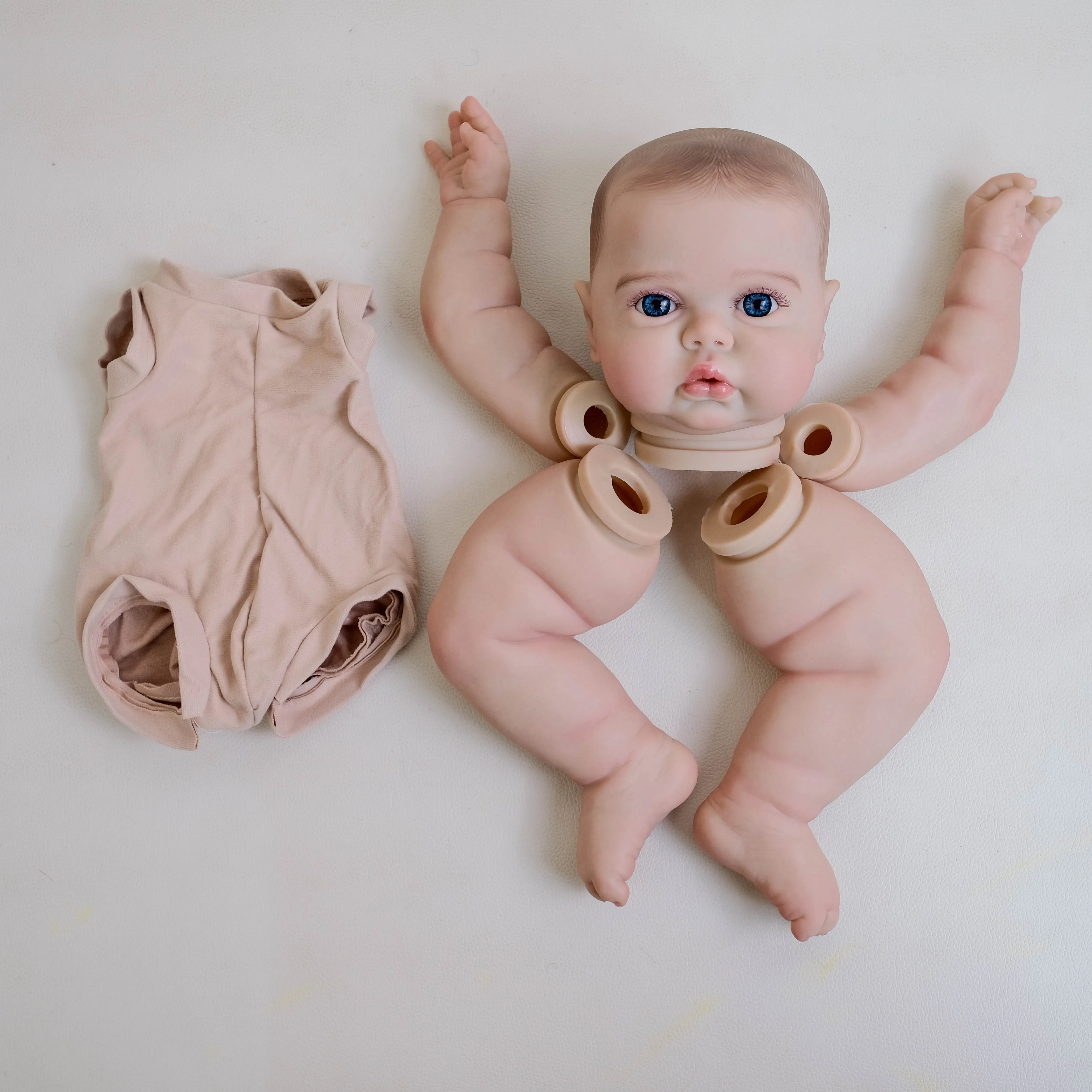 EGO – Kit de cornichon éveillé de 19 pouces, Kit de taille de poupée bébé Reborn déjà peint, réaliste, doux au toucher, cheveux courts blonds, pièces de poupée à monter soi-même