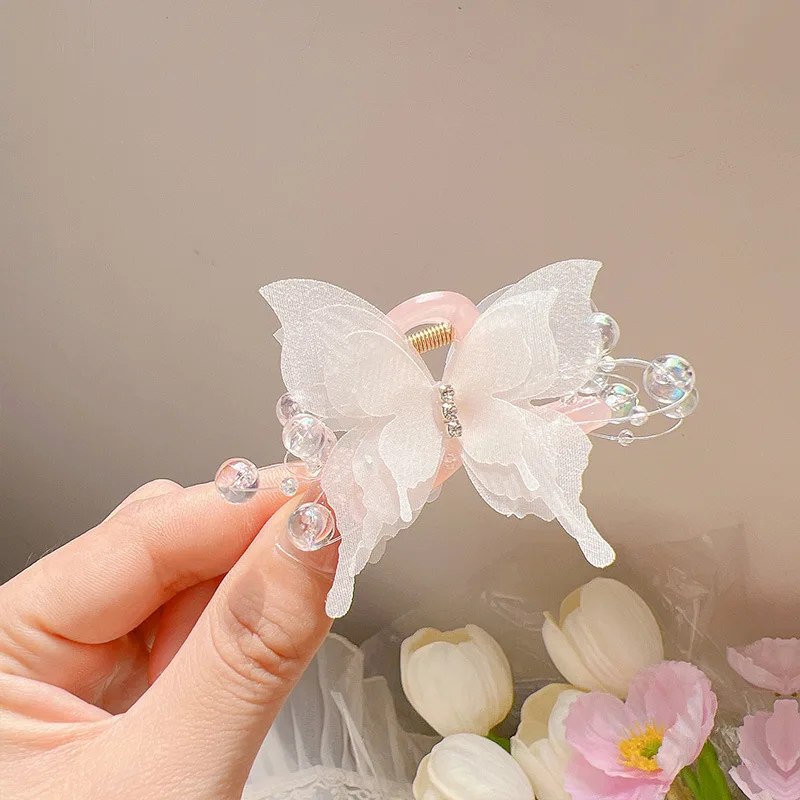 Nowy Rhinestone Butterfly Small Grab Clip dla kobiet Temperament Sweet Tie Hair Shark Clip Fashion Girl Hair Accessories