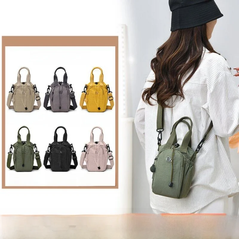 2026 New Lightweight Compact Water Cup Bag Women's Commuter Trendy Travel Crossbody Bag Handheld Single Shoulder Crossbody Bag