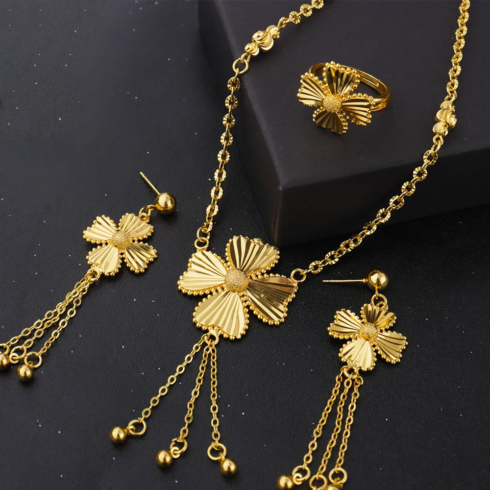

Elegant Gold-Tone Flower Jewelry Set for Women, Delicate Necklace Earrings Ring Gift for Party Wedding Daily Wear