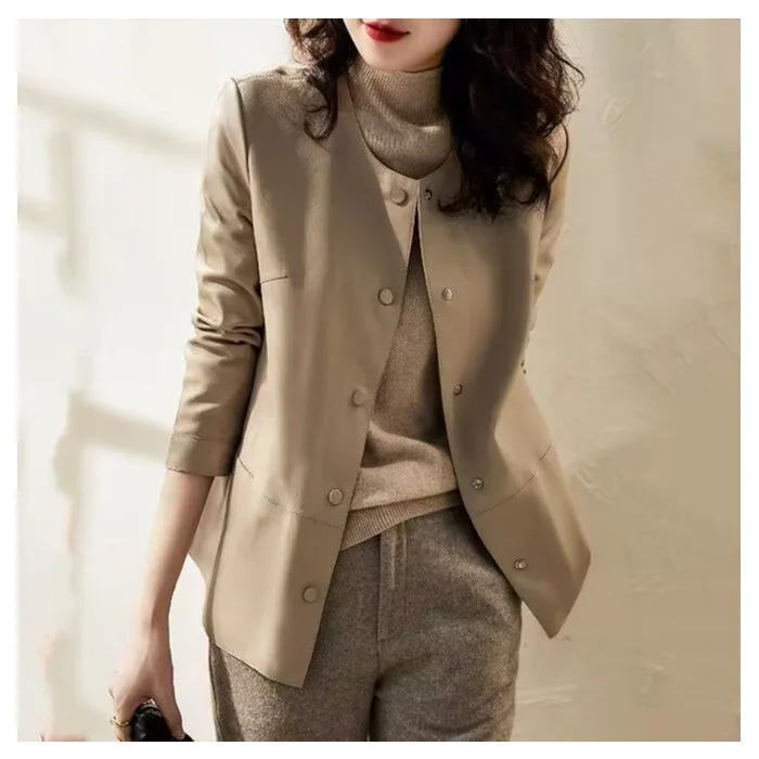 Giacca corta in ecopelle Y2K Colletto rovesciato Moda Decorazione bottoni Cappotto in PU 2026 Grunge Street Casual Cappotti da donna Capispalla