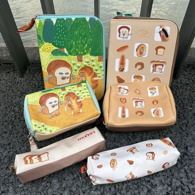 

Wholesale Japan Cartoon Bread Thief Notebook & Pouch Set - Cute Cosmetic Bag, Stationery Case Fashionable Storage Tote