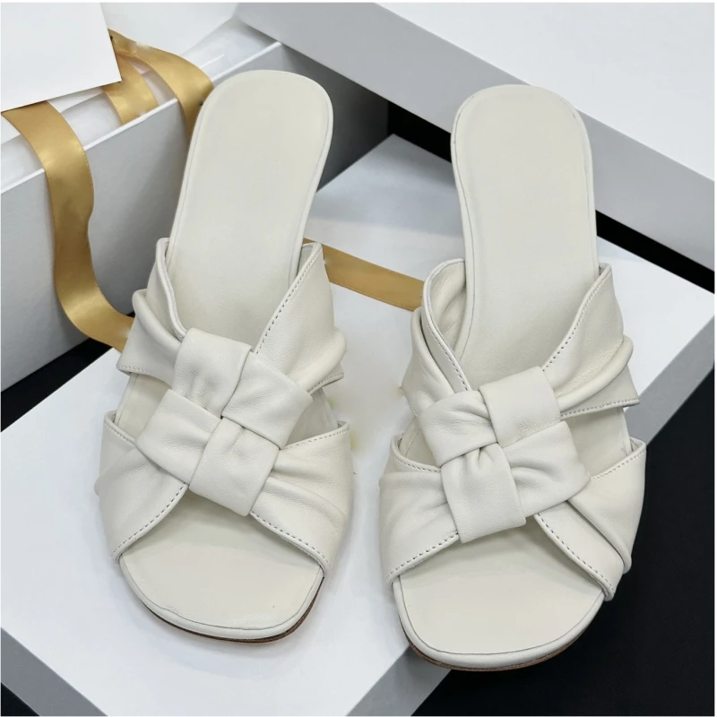25 year old new leather woven flat bottomed women's French lazy beach flat bottomed straight sandals for casual wear