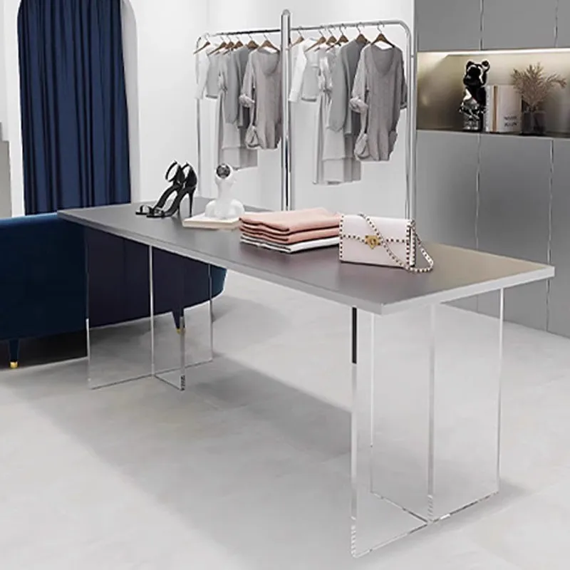 Clothing store table placed in the middle of acrylic water display table ornament stainless steel island table suspension
