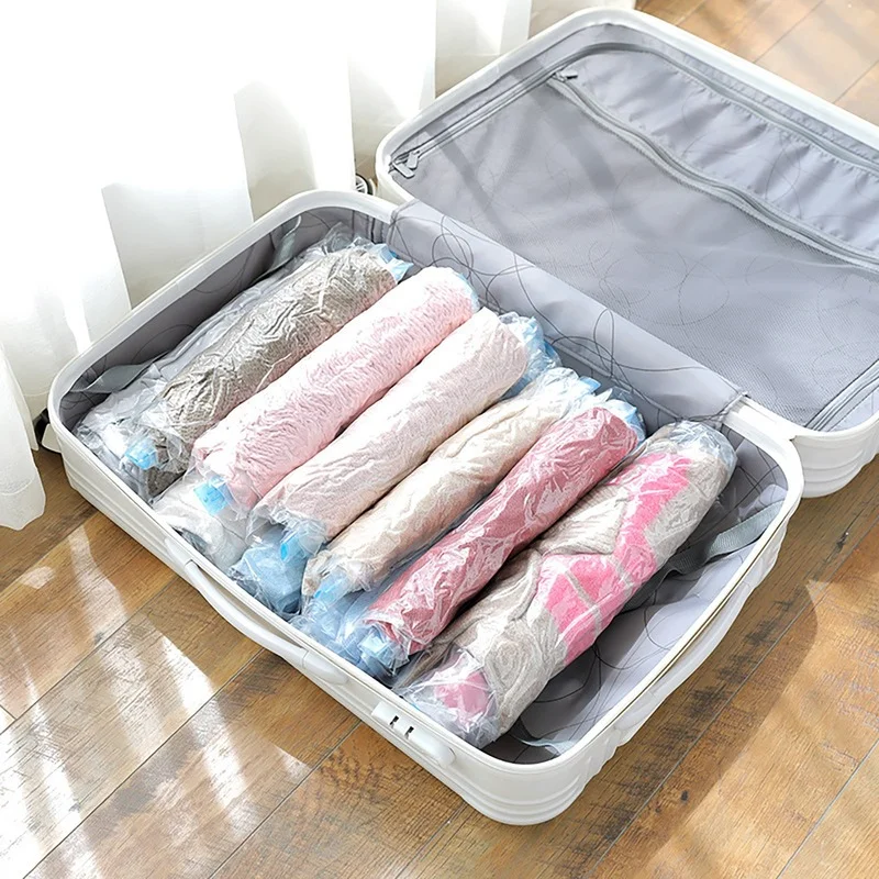 Vestiti da viaggio riutilizzabili sacchetti sottovuoto ad aria arrotolare borse di stoccaggio a compressione per valigie top pantaloni pieghevoli