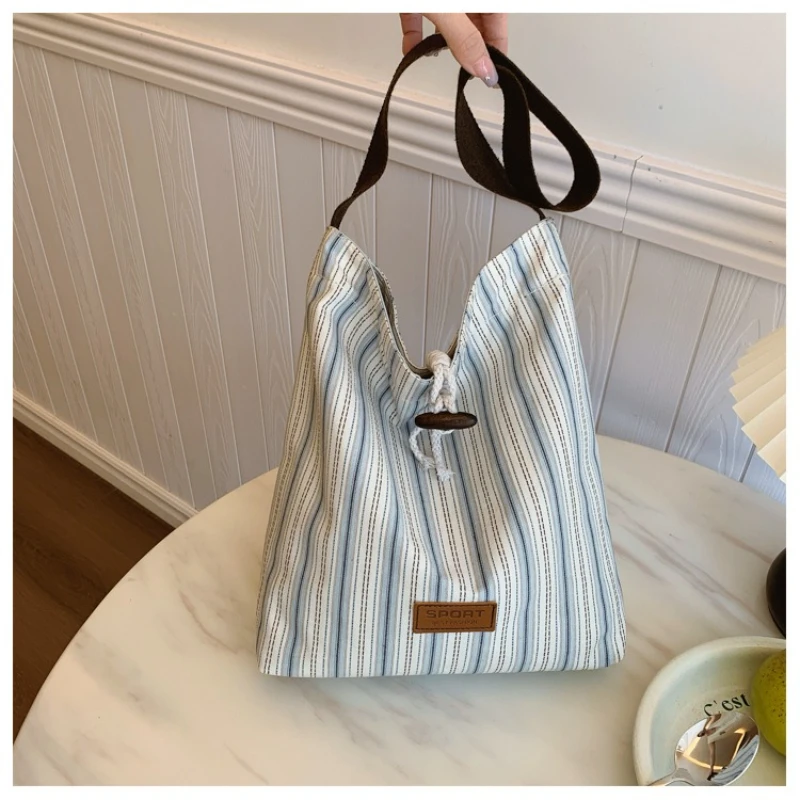 

Women's Shoulder Bag High-end Versatile Blue Stripe Large Capacity Tote Bucket Bag Niche Underarm Bag Shoulder Commuter Bag