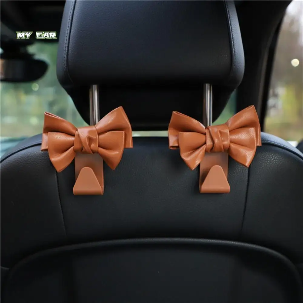 

2pcs Bowknot Car Seat Back Hook Multi-functional Durable Auto Fastener Clips Universal PU Leather Seat Back Hanger