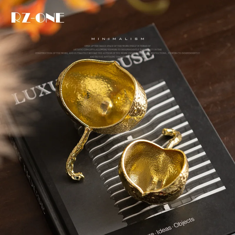 

High-end niche pomegranate shell metal wine cabinet bookcase niche shelf artwork pressing book ornament