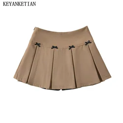 KEYANKETIAN 2024 New Launch Preppy Style Bow Decoration Wide-pleated Mini Skirt Side Zipper High-waisted Women's A-line Skirt